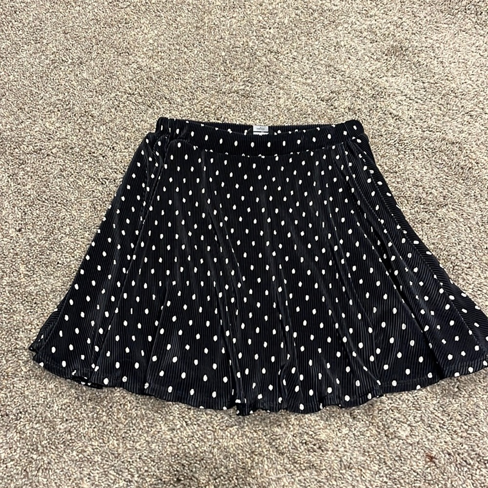 Black polka dot mini skirt